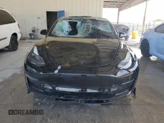 2021 Tesla Model 3 Standard Range Plus with VIN 5YJ3E1EA2MF048564, listed as a Copart auction lot 88754285 with 57,894 mi miles and Non Repairable. Bid and sale history available at DreamBid. Image 5.