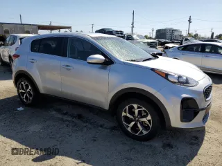 2021 Kia Sportage LX with VIN KNDPM3AC4M7863040, listed as a Copart auction lot 52040075 with 13,233 mi miles and Salvage Title. Bid and sale history available at DreamBid. Image 4.