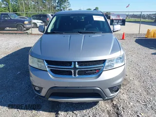 2017 Dodge Journey SXT z VIN 3C4PDCBG4HT563310, wystawiony jako IAAI lot #42190636 z przebiegiem 171 054 mil mil oraz . Historia ofert i sprzedaży dostępna na DreamBid. Obrazek 12.