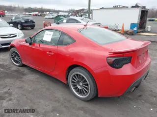 2013 Scion FR-S with VIN JF1ZNAA1XD1719798, listed as a IAAI auction lot 41863095 with 137,670 mi miles. Bid and sale history available at carsss.com. Image 3.
