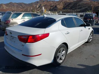 2015 Kia Optima LX with VIN 5XXGM4A71FG402624, listed as a IAAI auction lot 40493003 with 100,237 mi miles. Bid and sale history available at carsss.com. Image 4.