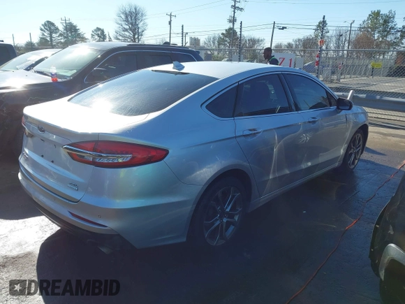 2019 Ford Fusion SEL with VIN 3FA6P0CD5KR270726, listed as a IAAI auction lot 41632088 with 131,820 mi miles. Bid and sale history available at carsss.com. Image 4.