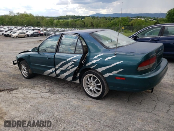 1997 Mitsubishi Galant ES z VIN 4A3AJ56G5VE019296, wystawiony jako Copart lot #56047635 z przebiegiem 87 533 mil mil oraz Szkoda całkowita • Salvage title. Historia ofert i sprzedaży dostępna na DreamBid. Obrazek 2.