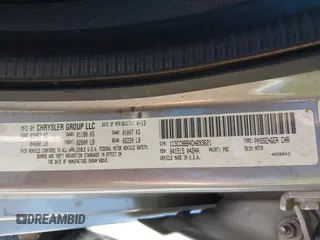 2013 Chrysler 200 Touring with VIN 1C3CCBBB4DN693621, listed as a IAAI auction lot 41738436 with 240,693 mi miles and . Bid and sale history available at DreamBid. Image 9.