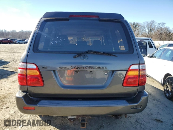 2002 Toyota Land Cruiser z VIN JTEHT05J122024015, wystawiony jako Copart lot #88706765 z przebiegiem Nie podano mil oraz Czysty tytuł • Clean title. Historia ofert i sprzedaży dostępna na DreamBid. Obrazek 6.
