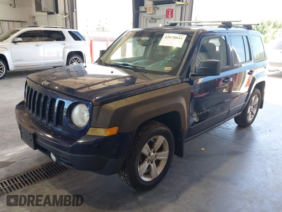 2014 Jeep Patriot Latitude with VIN 1C4NJRFB3ED863519, listed as a IAAI auction lot 42670843 with 220,920 mi miles and . Bid and sale history available at DreamBid. Image 2.