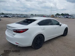 2018 Mazda 6 Grand Touring Reserve with VIN JM1GL1WY1J1321517, listed as a IAAI auction lot 39411226 with 50,280 mi miles and . Bid and sale history available at DreamBid. Image 4.