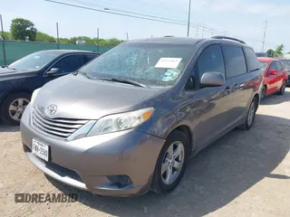 2012 Toyota Sienna LE AAS with VIN 5TDKK3DC8CS180967, listed as a IAAI auction lot 42215961 with 220,089 mi miles and . Bid and sale history available at DreamBid. Image 2.