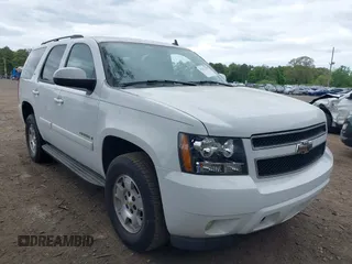 2007 Chevrolet Tahoe LT z VIN 1GNFK13027J364583, wystawiony jako IAAI lot #42313258 z przebiegiem 169 437 mil mil oraz . Historia ofert i sprzedaży dostępna na DreamBid. Obrazek 1.