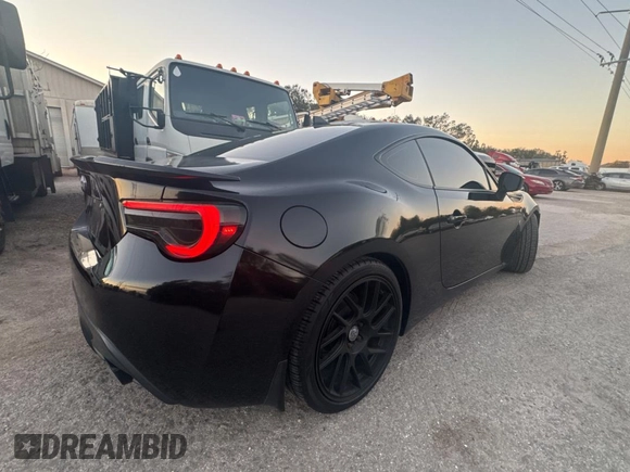 2017 Toyota 86 with VIN JF1ZNAA18H9706314, listed as a Copart auction lot 89272415 with 109,599 mi miles and Salvage Title. Bid and sale history available at carsss.com. Image 4.
