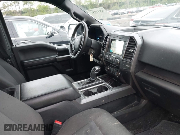 2018 Ford F-150 XL with VIN 1FTEW1EPXJFC85210, listed as a IAAI auction lot 42150759 with 97,660 mi miles and . Bid and sale history available at carsss.com. Image 5.