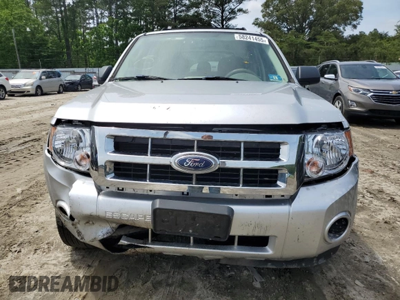 2010 Ford Escape XLS with VIN 1FMCU0C70AKB52226, listed as a Copart auction lot 58241455 with 237,785 mi miles and Salvage title. Bid and sale history available at DreamBid. Image 5.