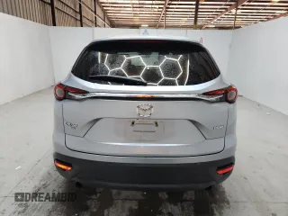 2023 Mazda CX-9 Touring with VIN JM3TCBCY9P0656636, listed as a Copart auction lot 64243905 with 59,788 mi miles and Non repairable. Bid and sale history available at DreamBid. Image 6.