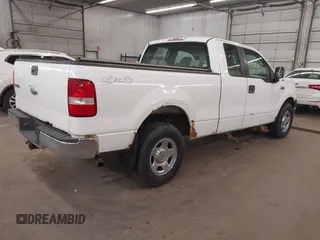 2005 Ford F-150 XLT with VIN 1FTPX14565NA51874, listed as a IAAI auction lot 41928006 with 201,004 mi miles. Bid and sale history available at carsss.com. Image 4.