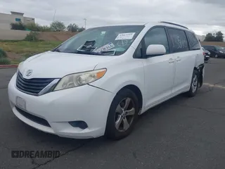 2012 Toyota Sienna LE AAS with VIN 5TDKK3DC4CS183817, listed as a IAAI auction lot 42013545 with 207,822 mi miles. Bid and sale history available at carsss.com. Image 2.