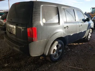 2013 Honda Pilot EX-L with VIN 5FNYF3H57DB038691, listed as a IAAI auction lot 41036795 with 210,278 mi miles. Bid and sale history available at carsss.com. Image 4.