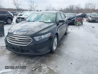 2013 Ford Taurus SEL with VIN 1FAHP2H80DG234999, listed as a IAAI auction lot 41577003 with 115,403 mi miles and . Bid and sale history available at DreamBid. Image 2.