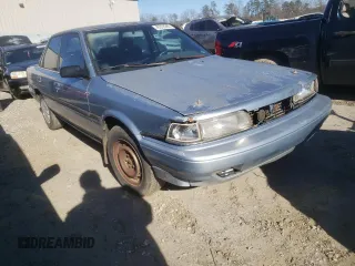 1991 Toyota Camry DLX z VIN 4T1SV21E2MU451022, wystawiony jako Copart lot #45333385 z przebiegiem 229 058 mil mil oraz Szkoda całkowita • Salvage title. Historia ofert i sprzedaży dostępna na DreamBid. Obrazek 4.