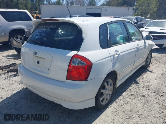 2006 Kia Spectra with VIN KNAFE162765318099, listed as a IAAI auction lot 41890796 with 241,431 mi miles. Bid and sale history available at carsss.com. Image 4.