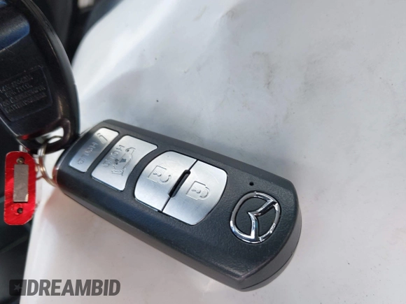 2019 Mazda CX-5 Grand Touring with VIN JM3KFBDM2K0603400, listed as a IAAI auction lot 42051135 with 59,448 mi miles and . Bid and sale history available at DreamBid. Image 11.