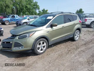 2013 Ford Escape SE with VIN 1FMCU9GX0DUA54515, listed as a IAAI auction lot 42330534 with 113,484 mi miles and . Bid and sale history available at DreamBid. Image 2.