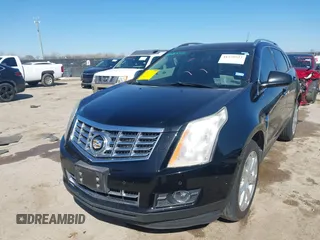2014 Cadillac SRX Performance Collection z VIN 3GYFNCE35ES517868, wystawiony jako IAAI lot #41775522 z przebiegiem 166 960 mil mil oraz . Historia ofert i sprzedaży dostępna na DreamBid. Obrazek 17.