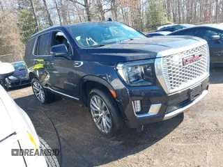 2023 GMC Yukon Denali with VIN 1GKS2DKL4PR460595, listed as a IAAI auction lot 41662354 with 21,735 mi miles. Bid and sale history available at carsss.com. Image 1.