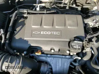 2018 Chevrolet Sonic Premier z VIN 1G1JF5SB0J4105719, wystawiony jako Copart lot #81480805 z przebiegiem 78 454 mil mil oraz Szkoda całkowita • Salvage title. Historia ofert i sprzedaży dostępna na DreamBid. Obrazek 13.