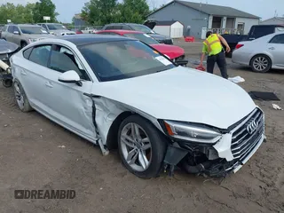 2019 Audi A5 Sportback Premium Plus with VIN WAUBNCF56KA015689, listed as a IAAI auction lot 42528104 with 108,932 mi miles and . Bid and sale history available at DreamBid. Image 1.