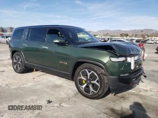 2024 Rivian R1S Adventure z VIN 7PDSGABA6RN033514, wystawiony jako Copart lot #89296455 z przebiegiem Nie podano mil oraz Szkody całkowita. Historia ofert i sprzedaży dostępna na DreamBid. Obrazek 4.