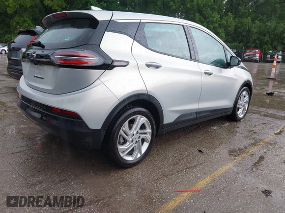 2023 Chevrolet Bolt EV 1LT with VIN 1G1FW6S03P4140824, listed as a IAAI auction lot 42383006 with 23,942 mi miles and . Bid and sale history available at DreamBid. Image 4.