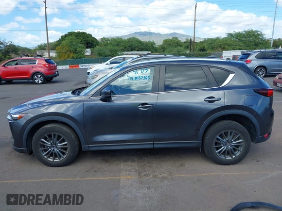2021 Mazda CX-5 Touring with VIN JM3KFACM2M1348305, listed as a IAAI auction lot 41627199 with 30,044 mi miles. Bid and sale history available at carsss.com. Image 15.