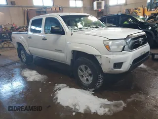 2013 Toyota Tacoma with VIN 3TMLU4EN2DM104490, listed as a IAAI auction lot 41636616 with 153,036 mi miles and . Bid and sale history available at DreamBid. Image 1.