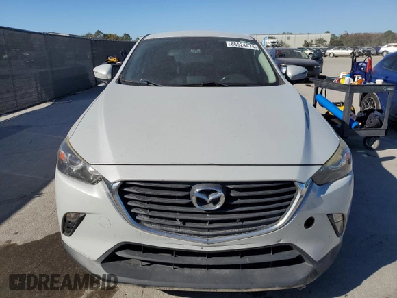 2018 Mazda CX-3 Touring with VIN JM1DKDC77J0305749, listed as a Copart auction lot 86524474 with 112,562 mi miles and Salvage Title. Bid and sale history available at DreamBid. Image 5.