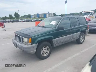 1998 Jeep Grand Cherokee Laredo with VIN 1J4GZ58S7WC284106, listed as a IAAI auction lot 42558498 with 316,354 mi miles and . Bid and sale history available at DreamBid. Image 2.