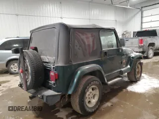 1999 Jeep Wrangler Sahara with VIN 1J4FY49SXXP451964, listed as a Copart auction lot 46120595 with 162,944 mi miles and Clean Title. Bid and sale history available at carsss.com. Image 3.