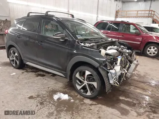 2018 Hyundai Tucson Value with VIN KM8J3CA28JU648236, listed as a IAAI auction lot 41161221 with 104,057 mi miles. Bid and sale history available at carsss.com. Image 1.
