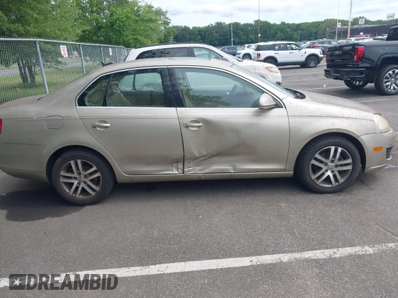 2006 Volkswagen Jetta 2.5L z VIN 3VWSF71K76M750076, wystawiony jako IAAI lot #42769137 z przebiegiem 99 114 mil mil oraz . Historia ofert i sprzedaży dostępna na DreamBid. Obrazek 12.