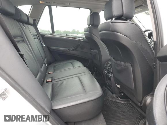 2012 BMW X5 35i with VIN 5UXZV4C57CL747717, listed as a Copart auction lot 63003135 with 135,999 mi miles and Clean title. Bid and sale history available at DreamBid. Image 11.