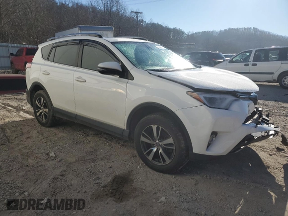 2018 Toyota RAV4 XLE with VIN JTMRFREV7JJ741076, listed as a Copart auction lot 45454135 with 128,402 mi miles and Salvage Title. Bid and sale history available at carsss.com. Image 4.