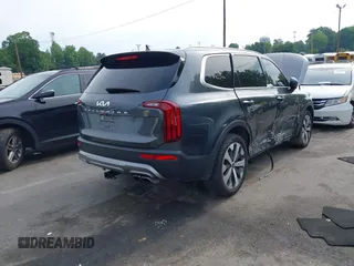 2022 Kia Telluride S z VIN 5XYP64HCXNG225885, wystawiony jako IAAI lot #42289777 z przebiegiem 87 296 mil mil oraz . Historia ofert i sprzedaży dostępna na DreamBid. Obrazek 4.