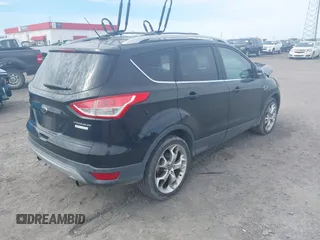 2013 Ford Escape Titanium z VIN 1FMCU0J90DUB32703, wystawiony jako IAAI lot #41714424 z przebiegiem 127 639 mil mil oraz . Historia ofert i sprzedaży dostępna na DreamBid. Obrazek 4.