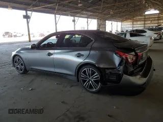 2015 Infiniti Q50 Premium with VIN JN1BV7AP1FM342088, listed as a Copart auction lot 56920195 with 106,585 mi miles and Salvage title. Bid and sale history available at DreamBid. Image 2.
