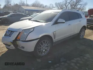 2015 Cadillac SRX Premium Collection with VIN 3GYFNGE35FS546957, listed as a Copart auction lot 42189045 with 100,079 mi miles and Salvage Title. Bid and sale history available at carsss.com. Image 1.