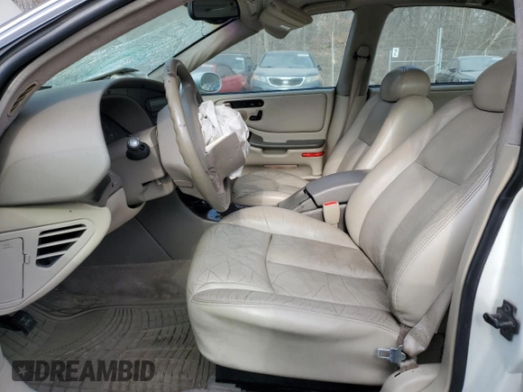 1999 Oldsmobile Aurora with VIN 1G3GR62C4X4112642, listed as a Copart auction lot 48176035 with 100,342 mi miles and Salvage Title. Bid and sale history available at DreamBid. Image 7.