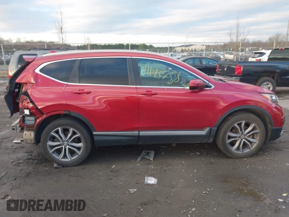 2020 Honda CR-V Touring with VIN 2HKRW2H96LH659793, listed as a IAAI auction lot 41145758 with 113,344 mi miles and . Bid and sale history available at DreamBid. Image 14.