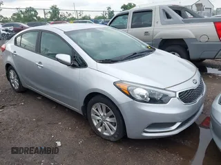 2016 Kia Forte LX z VIN KNAFX4A65G5476917, wystawiony jako IAAI lot #42465651 z przebiegiem 98 554 mil mil oraz . Historia ofert i sprzedaży dostępna na DreamBid. Obrazek 1.