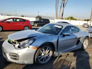 2014 Porsche Cayman with VIN WP0AA2A84EK173761, listed as a Copart auction lot 77971344 with 37,578 mi miles and Salvage Title. Bid and sale history available at DreamBid. Image 1.
