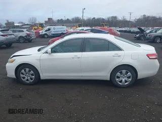 2011 Toyota Camry LE with VIN 4T4BF3EK3BR198945, listed as a IAAI auction lot 41879536 with 297,861 mi miles. Bid and sale history available at carsss.com. Image 14.