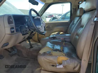 1997 GMC Suburban z VIN 1GKFK16R0VJ749323, wystawiony jako Copart lot #50222125 z przebiegiem 209 355 mil mil oraz Szkody całkowita. Historia ofert i sprzedaży dostępna na DreamBid. Obrazek 7.